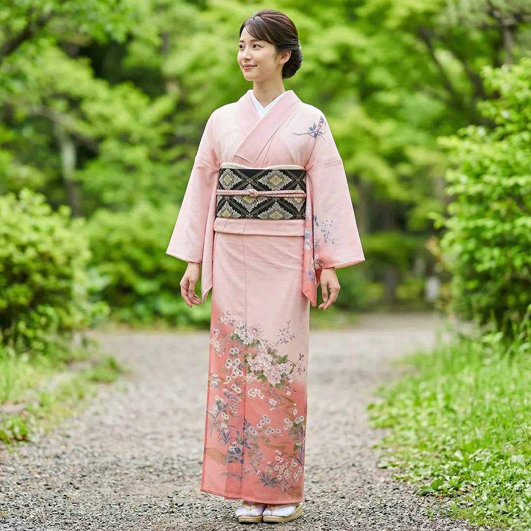 ピンク地に花尽しの訪問着(絽)（ポリエステル）